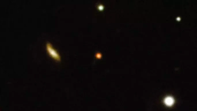 NASA bắt được tín hiệu "xuyên không" từ thế giới 12,8 tỉ năm trước ảnh 0