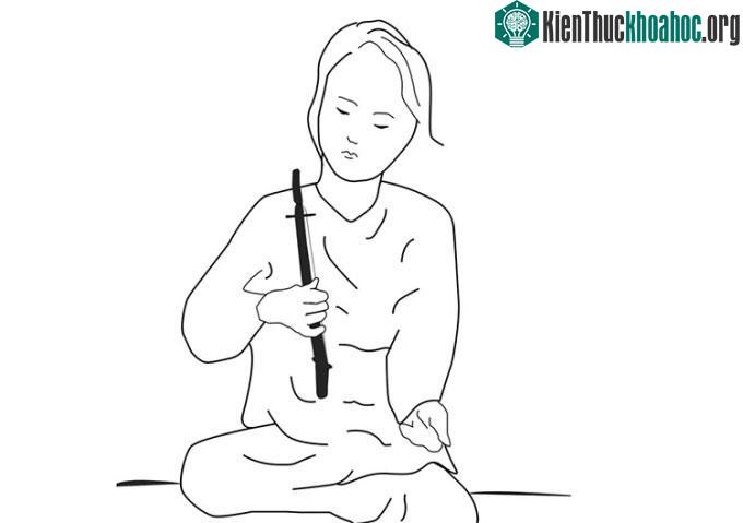 Minh họa cách mà người xưa có thể đã chơi nhạc cụ 2.000 năm tuổi.
