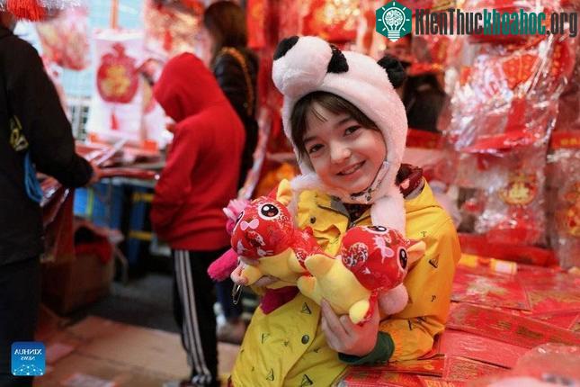 Cộng đồng người châu Á trên khắp thế giới đón Tết Nguyên đán ảnh 23