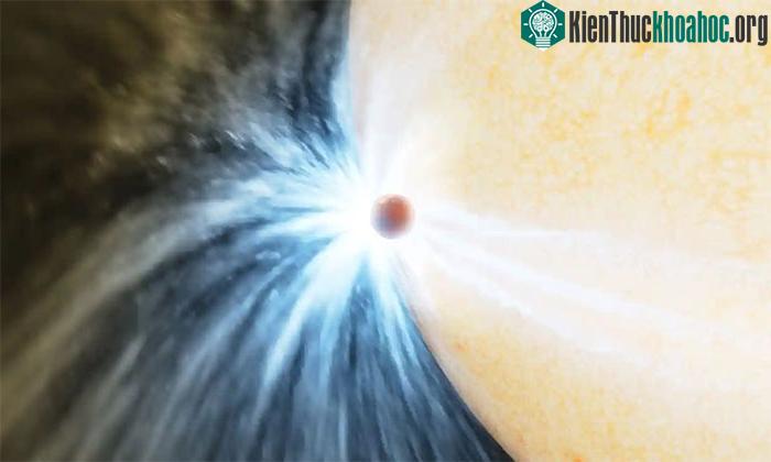 Hình minh họa một hành tinh vào cuối vòng đời lướt qua bề mặt ngôi sao chủ của nó.