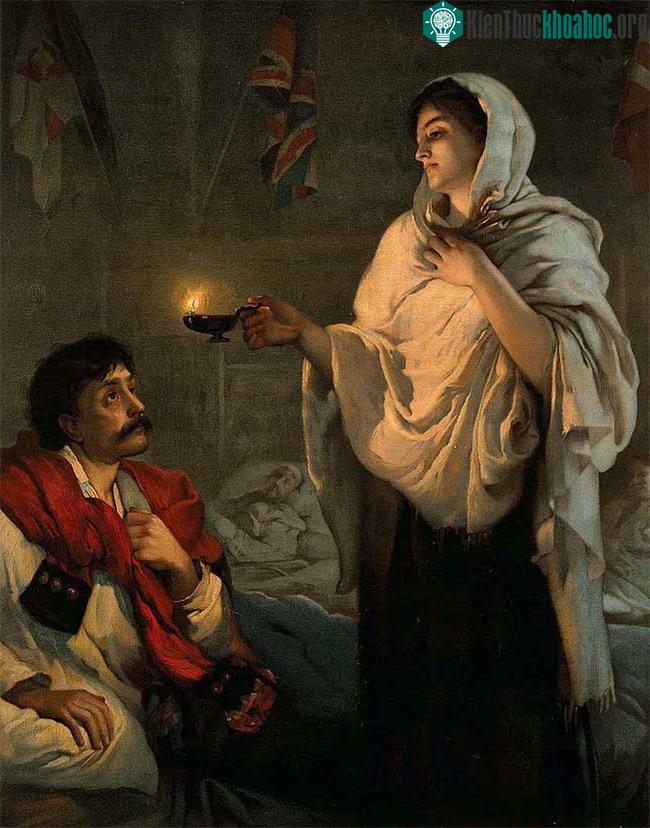 Bản sao của bức tranh "Quý bà cầm ngọn đèn" của Henrietta Rae, năm 1891.