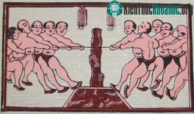 Trong ảnh là nghi lễ và trò chơi kéo co dân gian được mô phỏng trên tranh Đông Hồ (Hà Nội).