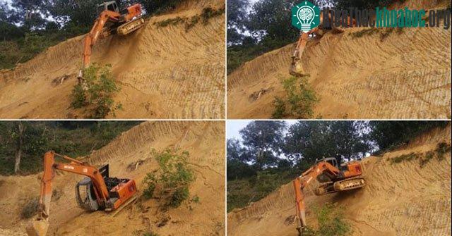 Máy xúc đổ đèo