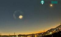 Ảnh Vật thể giống như UFO lao qua bầu trời Bắc Kinh