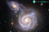 Ảnh Kinh hoàng thiên hà "Xúc Xích" bị "quái vật" Milky Way nuốt chửng
