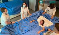 Ảnh ESA tiến hành thí nghiệm cho phụ nữ nằm trên giường nước 5 ngày